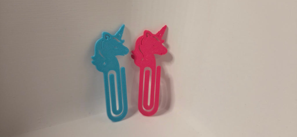 Blue and pink 3D printed unicorn bookmarks