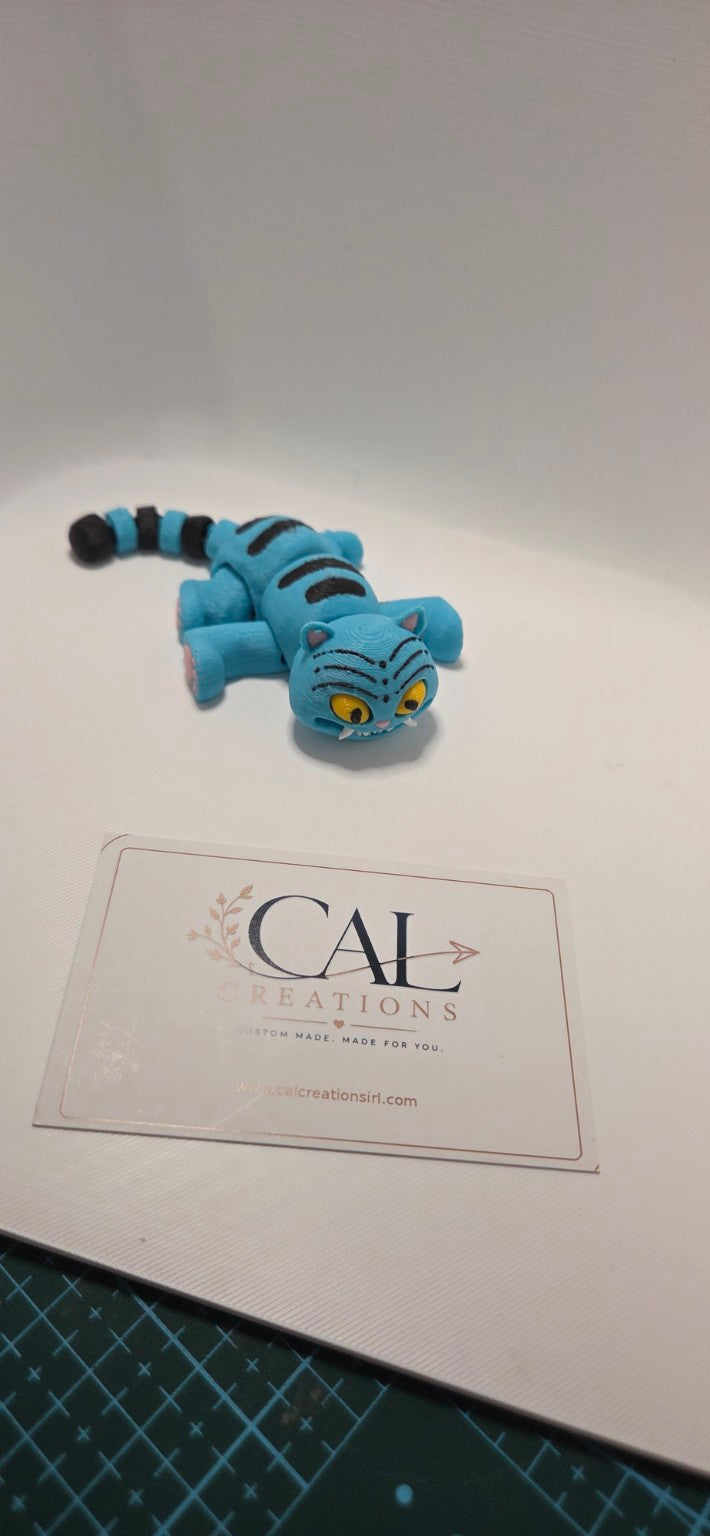 Front view of articulated blue Derpy cat figure with CalCreations branding
