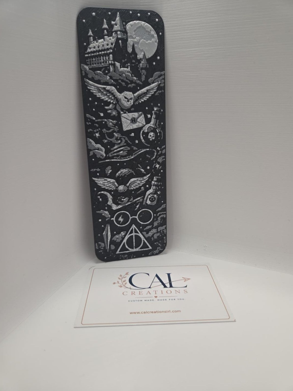Full length view of wizarding magic bookmark with CalCreations branding