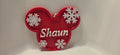 Red and white personalised Christmas mouse ears decoration with snowflakes and the name Shaun